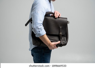 Brown Men's Shoulder Leather Bag For A Documents And Laptop Holds By Man In A Blue Shirt And Jeans With A White Background. Satchel, Mens Leather Handmade Briefcase.