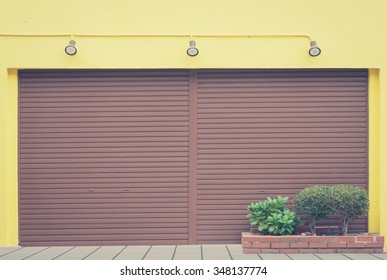 Brown Metal Shutter Door Of Store Closed 