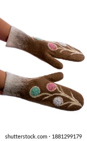 Brown Mittens Made Of Felted Wool On A White Background