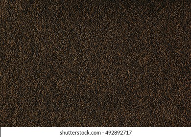 Brown Monotone Grain Texture. Dark Sand Background.