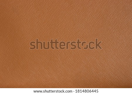 Brown natural or genuine leather texture for background. Saffiano leather.