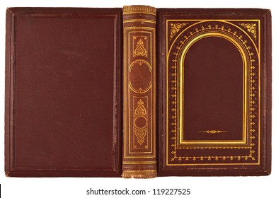 brown, old book with gilded ornament isolated on white