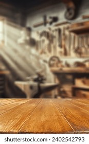 Brown old desk of empty space for your decoration. Blurred background of workshop in home interior. Natural sun light and mood. Mockup and space for your products. 