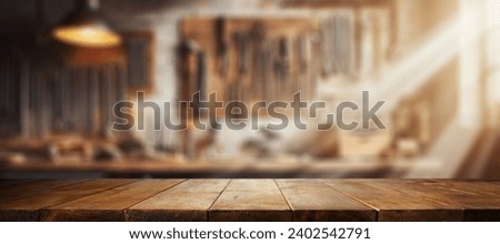 Brown old desk of empty space for your decoration. Blurred background of workshop in home interior. Natural sun light and mood. Mockup and space for your products. 