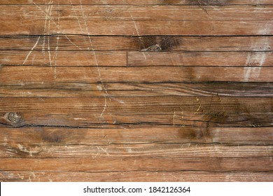 brown old wooden boards in an horizontal fence wall of a rustic house, a viking boat, or the surface of a blackened table of wood - steampunk wallpaper with background panels
