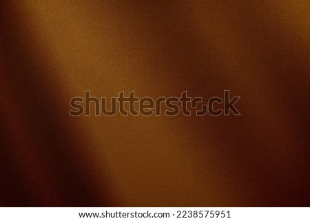 Brown orange silk satin. Fabric background for design. Gradient. Chocolate color. Dark abstract elegant background. Matte, shimmer. Template.