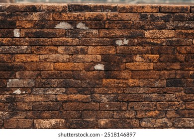 Brown and orange weathered brick wall, textured surface suitable for backgrounds, textures, construction concepts, and rustic designs. - Powered by Shutterstock