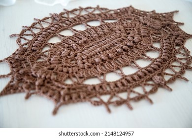 Brown Oval Doily. This Photo Has Been Taken In Prague, 2022