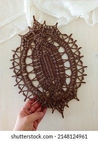 Brown Oval Doily. This Photo Has Been Taken In Prague, 2022