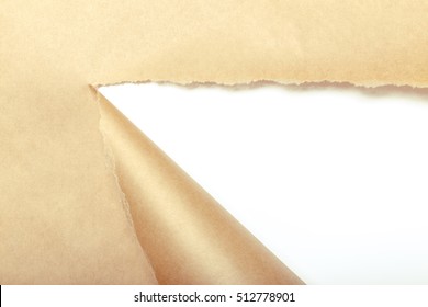 Brown Package Paper Torn To Reveal White Panel