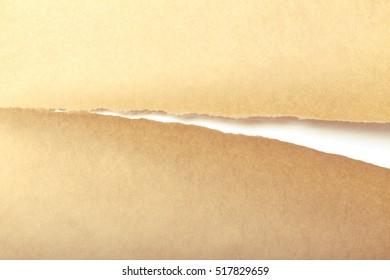 Brown Package Paper Torn To Reveal White Panel