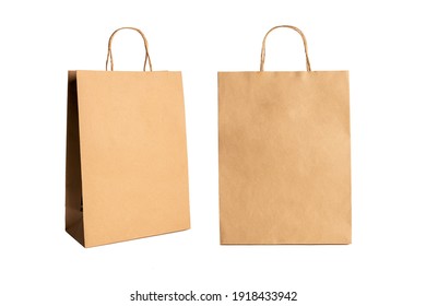 Brown paper bags isolated on white background. - Shutterstock ID 1918433942