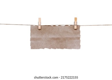 Brown paper blank hanging on wood clothes pegs  hang on white string line isolated on white background , clipping path