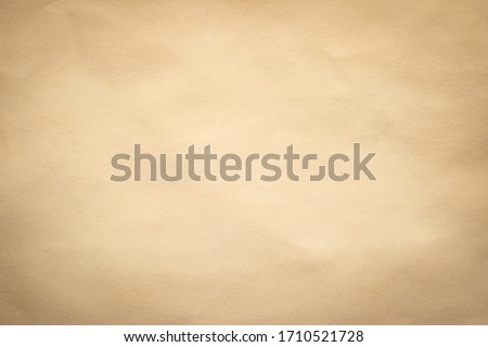 Brown paper, craft abstract background. Retro, old antique vintage paper art pattern texture background. Detail paperboard texture of pattern with free space copy for text, vignette effect.