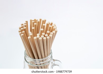 Brown paper drinking straws in a glass. environmental consciousness concept