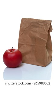 Brown Paper Lunch Bag With Red Apple