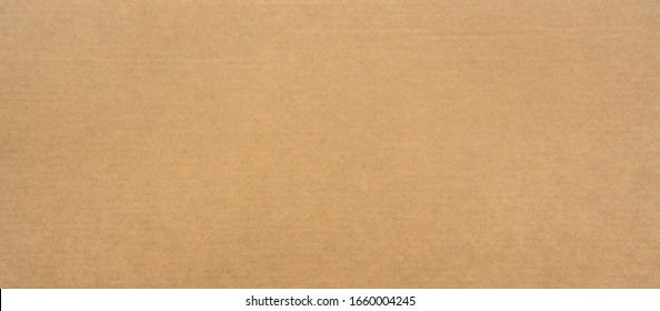 Brown paper texture for background. Seamless surface cardboard box for design. Backdrop recycle paper product or education concept.