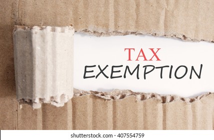 brown paper torn off revealing a white section. tax exemption text written on white section