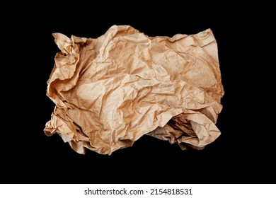 brown paper wad on black background