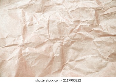 Brown paper with wrinkle patterns abstract for abstract background