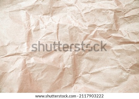 Brown paper with wrinkle patterns abstract for abstract background