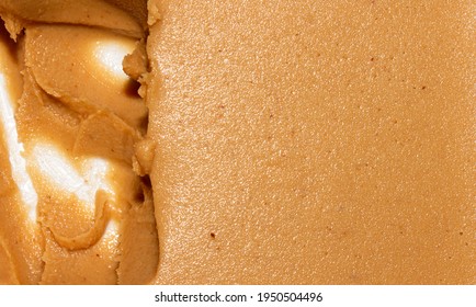 Brown peanut paste made from whole nuts.The texture of peanut paste top view.Peanut butter background. - Powered by Shutterstock