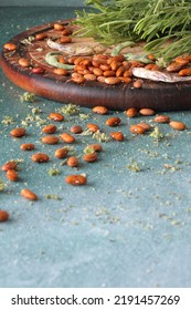 Brown, Pinto Beans From Italian Garden On Teal Background. Rosemary. Grandma Cooking.