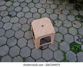 Brown Plastic Chair In The School Garden