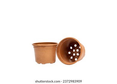Brown plastic flowerpot plant pot on white background