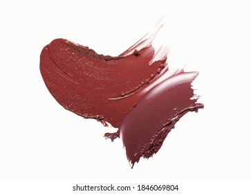 Brown Plum Dark Lipstick Smudged On White Background