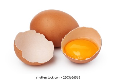 Brown raw eggs and one broken isolated on white background
