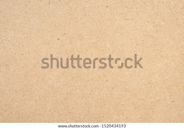 Brown recycle paper cardboard texture background\
from a paper box packing. reduce, reuse, recycle, Ecology\
environmental safety\
concept
