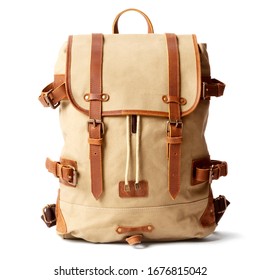 Brown Retro Vintage Canvas Backpack Isolated. Satchel Rucksack with Leather Trim, Brass Hardware. Beige Camping Daypack Front View. Travel Back Pack. Drawstring Bag with Shoulder Straps & Haul Loop - Shutterstock ID 1676815042
