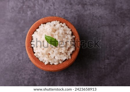 Brown Rice or Kerala boiled rice. Traditional Onam sadhya rice popular with Sambar, Rasam, parippu dal curry ghee Vishu Pongal Diwali festival vegetarian food Kerala Tamil Nadu South India.