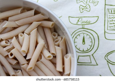 Brown Rice Pasta In White Bowl On Tablecloths