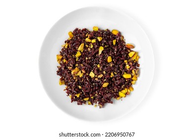 Brown Rice With Pistachios And Seeds. Balanced, Nutritious, Tasty And Nutritious Food. Ready-made Menu For A Restaurant Or For Delivery. Dish In A White Plate Isolated On A White Background.