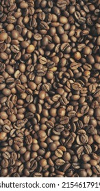 Brown roasted coffee beans, background