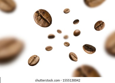 Brown roasted coffee beans falling and flying on black background.Represent breakfast for energy and freshness concept. - Shutterstock ID 1555130042