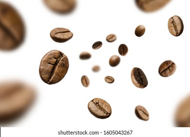 Brown roasted coffee beans falling and flying on black background.Represent breakfast for energy and freshness concept. - Shutterstock ID 1605043267