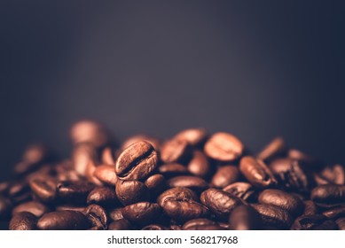 Brown Roasted Coffee Beans, Seed On Dark Background. Espresso Dark, Aroma, Black Caffeine Drink. Closeup Isolated Energy Mocha, Cappuccino Ingredient.