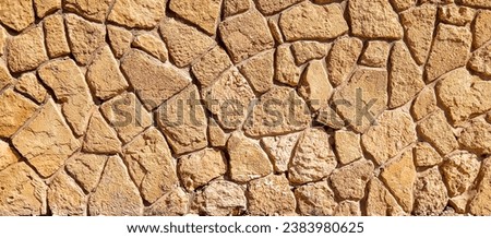 Brown rough stonewall. Abstract brow, stonewall textured background. Brown stones wall banner