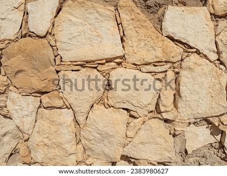 Brown rough stonewall. Abstract brow, stonewall textured background. Brown stones wall banner