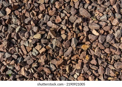 Brown Rubble Texture. Gravel Pebbles Stone Background. Brown Small Rocks Ground. 