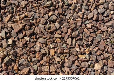 Brown Rubble Texture. Gravel Pebbles Stone Background. Brown Small Rocks Ground. 