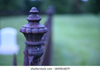 Brown Rusted Rod Iron Fence