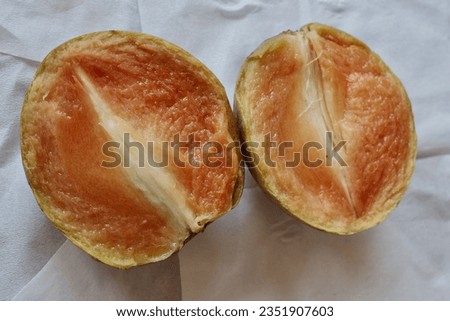 brown sapodilla fruit that is fresh and sweet