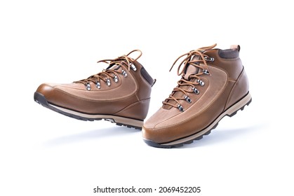 brown shoes.white background. winter boots. boots for mountains