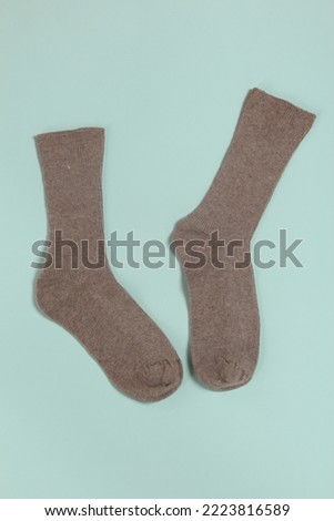  Brown socks on blue background. 