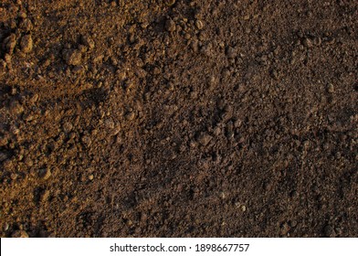 Brown soil texture background cultivated organic