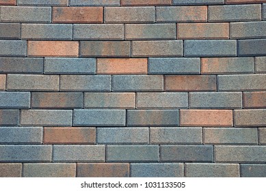 Brown stone background from fragment brick wall